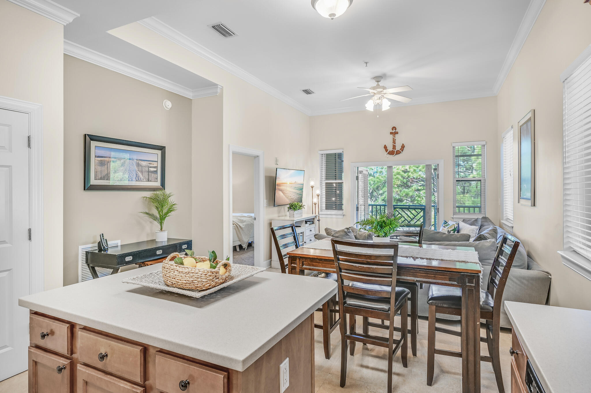 231 Somerset Bridge Road, Unit 1401 Santa Rosa Beach, FL 32459 - Photo 13 of 38 a view of a dining room with furniture and a chandelier