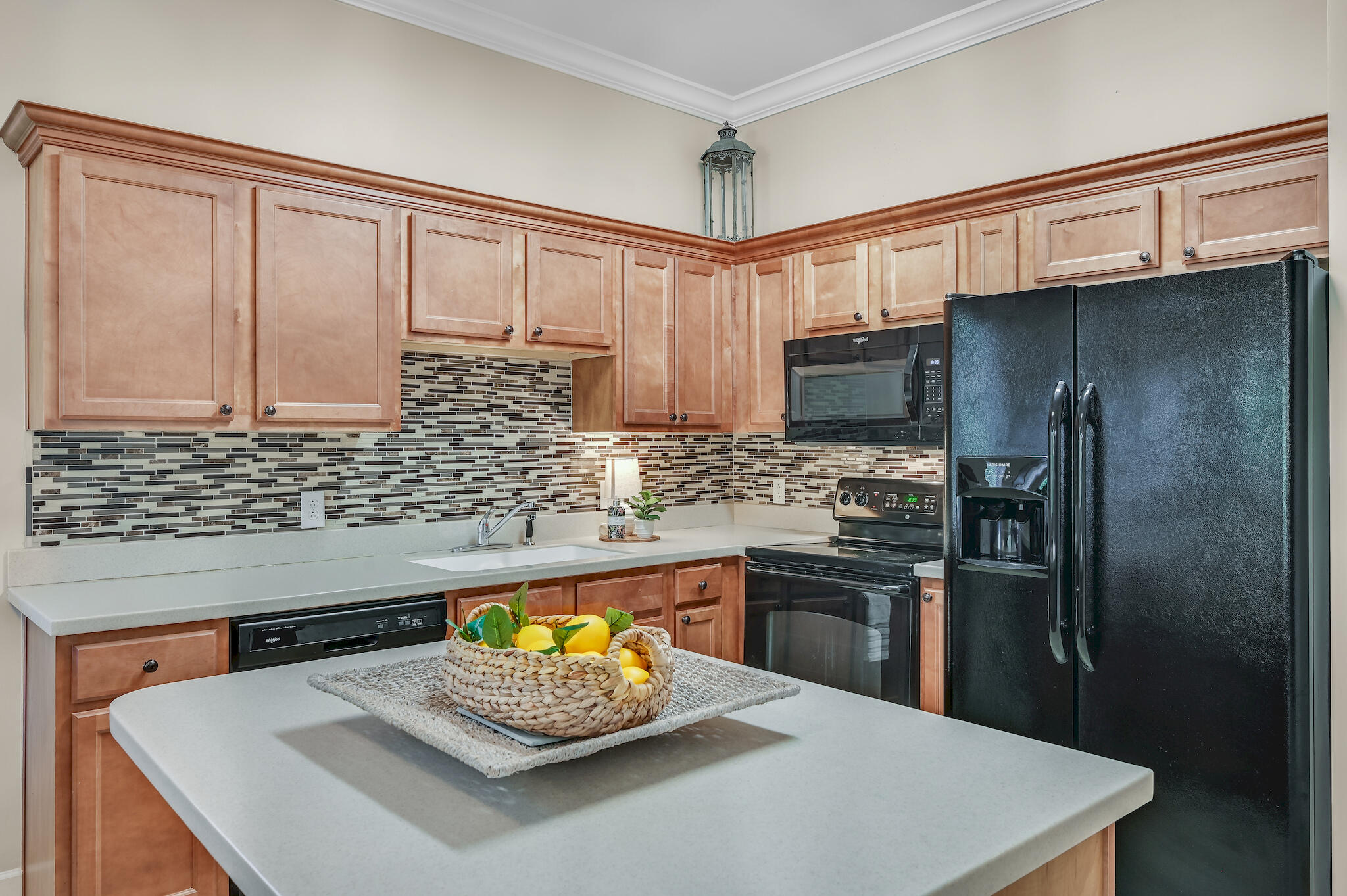 231 Somerset Bridge Road, Unit 1401 Santa Rosa Beach, FL 32459 - Photo 16 of 38 a kitchen with stainless steel appliances granite countertop a sink refrigerator and microwave