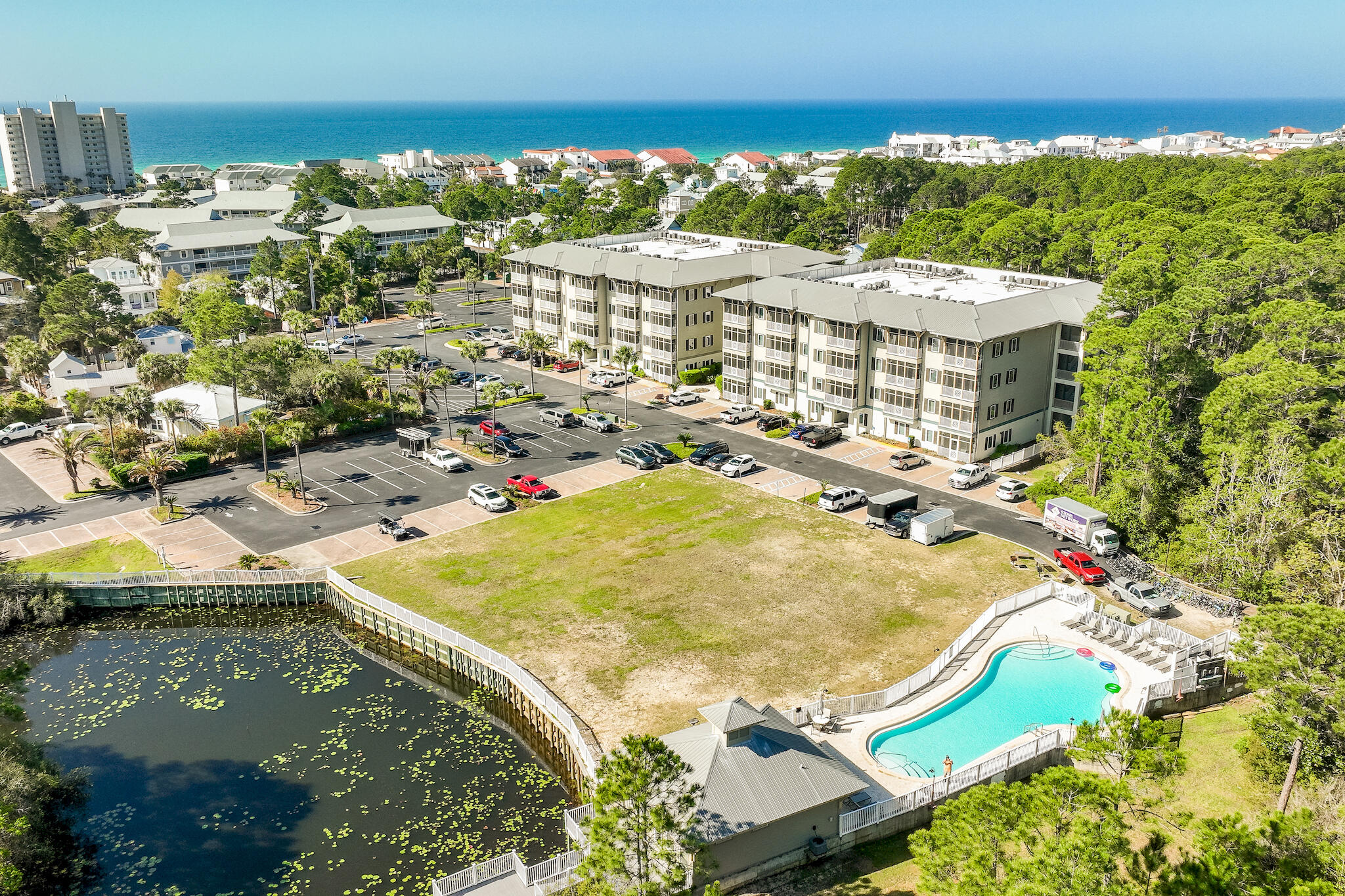 231 Somerset Bridge Road, Unit 1401 Santa Rosa Beach, FL 32459 - Photo 2 of 38 an aerial view of residential houses with outdoor space