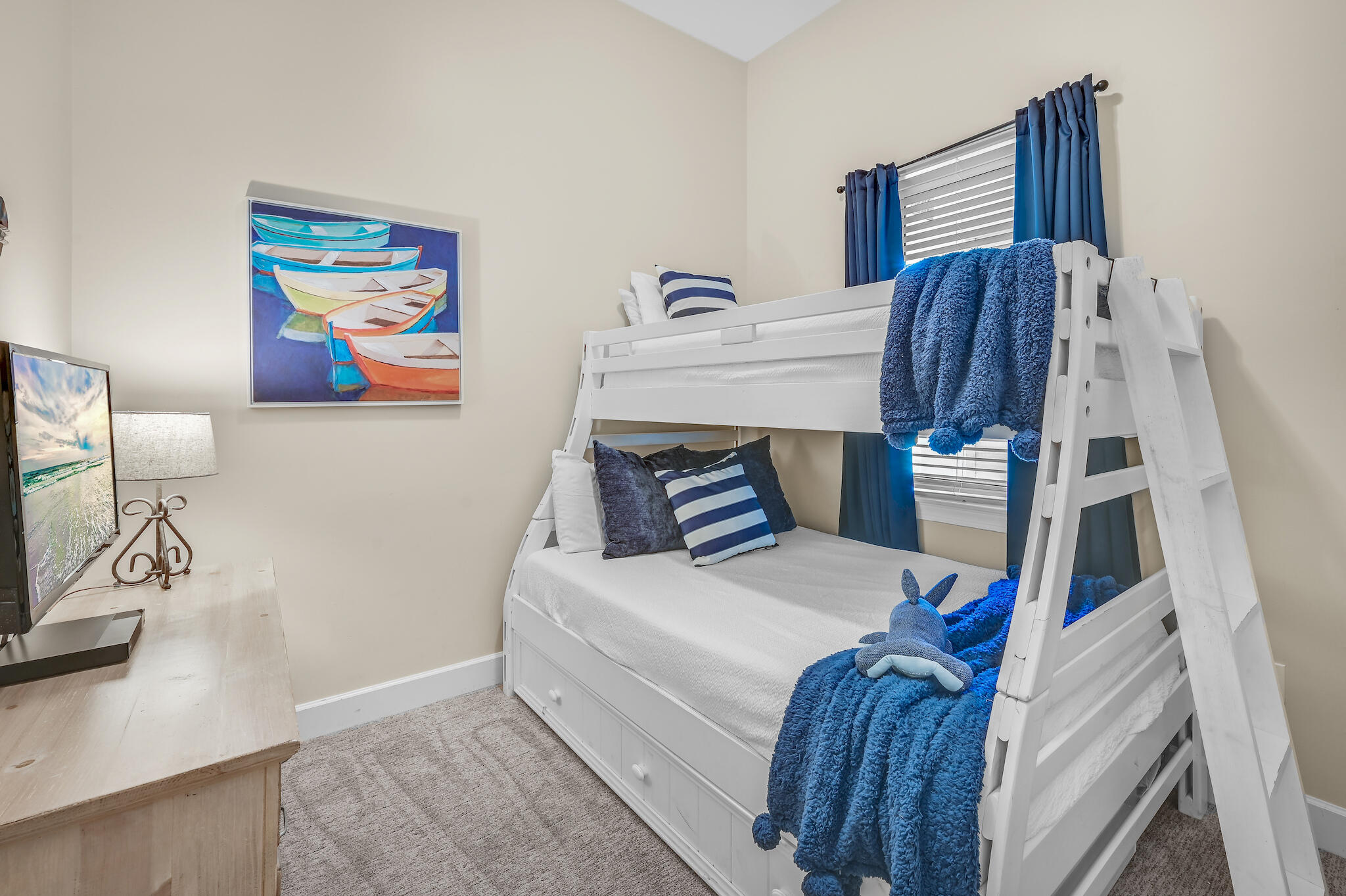 231 Somerset Bridge Road, Unit 1401 Santa Rosa Beach, FL 32459 - Photo 25 of 38 a bedroom with a bed and a flat screen tv