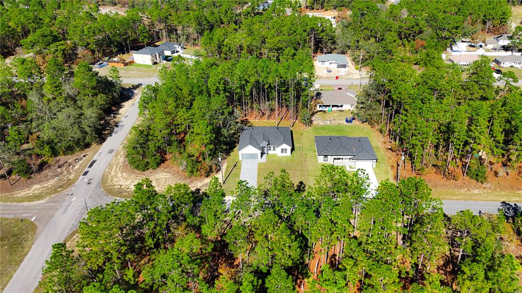 1915 West Linden Drive Dunnellon, FL 34434 - Photo 49 of 51 an aerial view of a house with a yard and garden