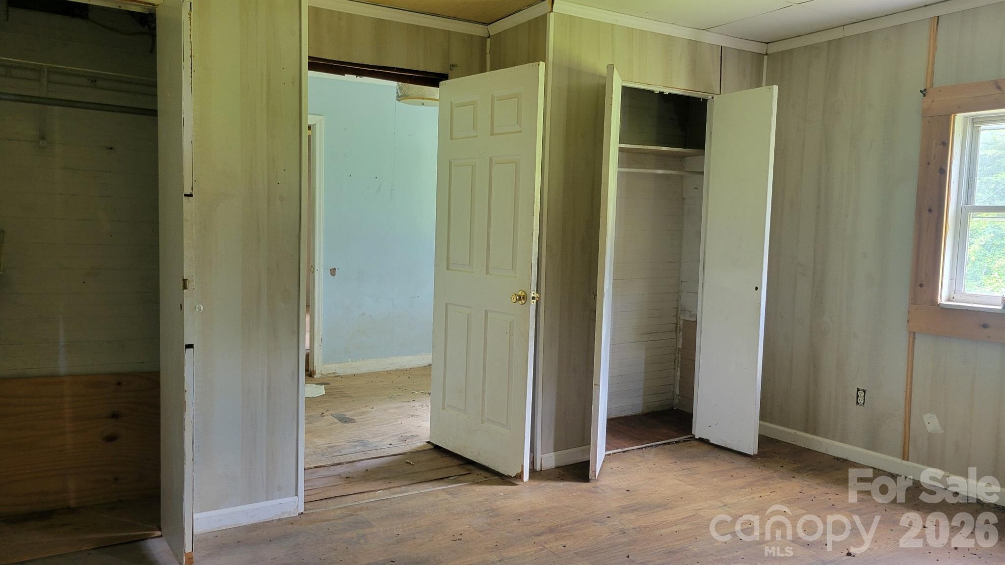 1672 Riverview Road Lincolnton, NC 28092 - Photo 11 of 16 an empty room with windows and closet