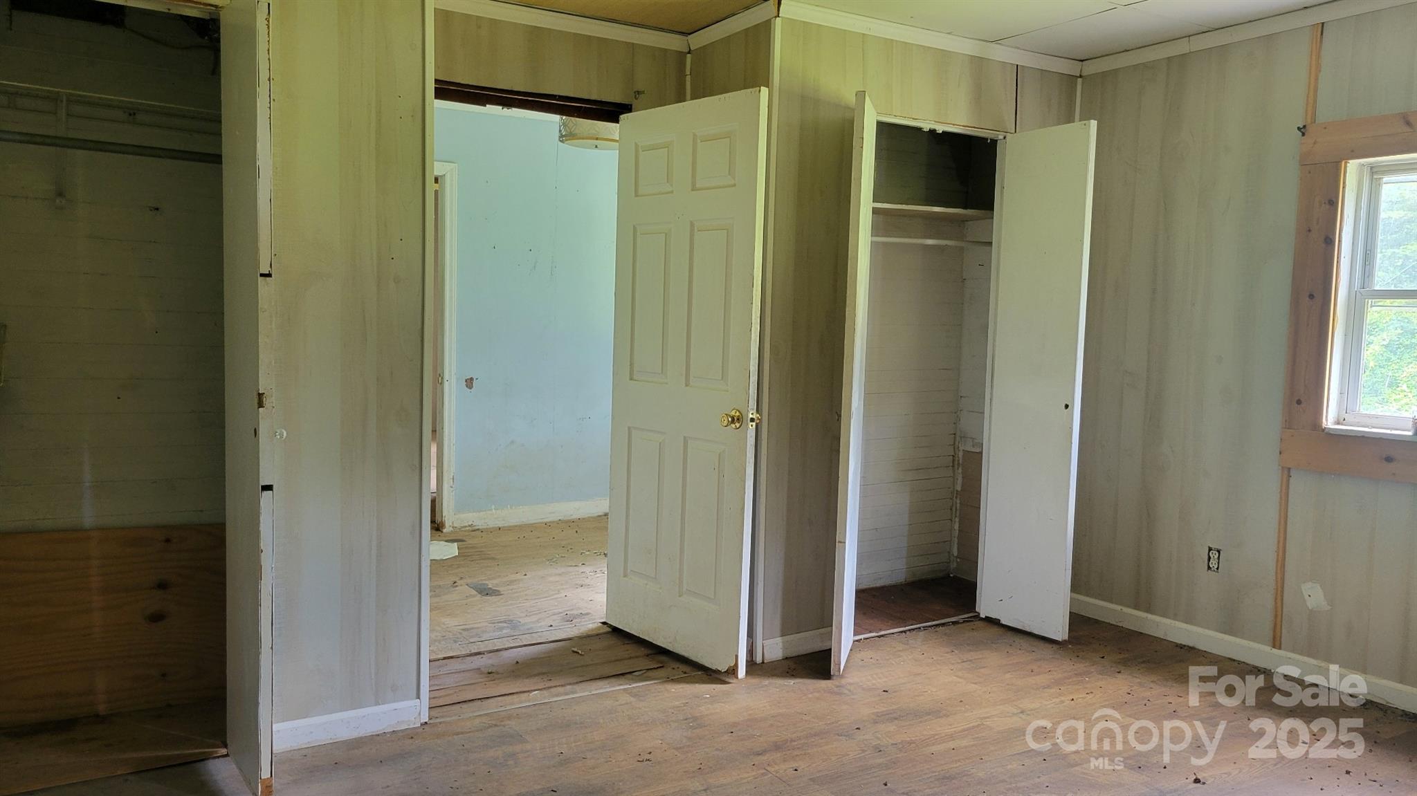 1672 Riverview Road Lincolnton, NC 28092 - Photo 11 of 15 an empty room with windows and closet