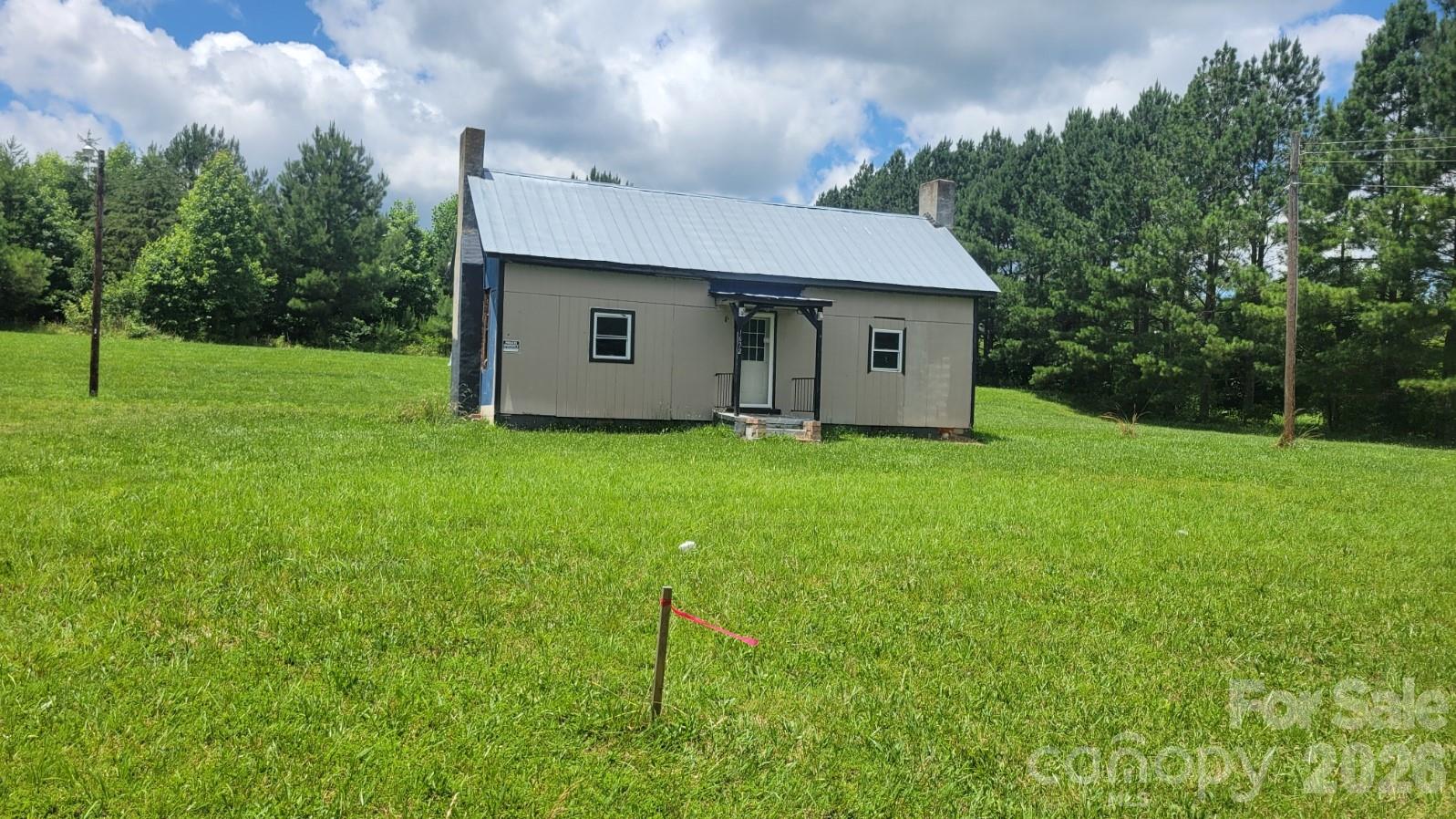 1672 Riverview Road Lincolnton, NC 28092 - Photo 7 of 16 a backyard of a house with lots of green space