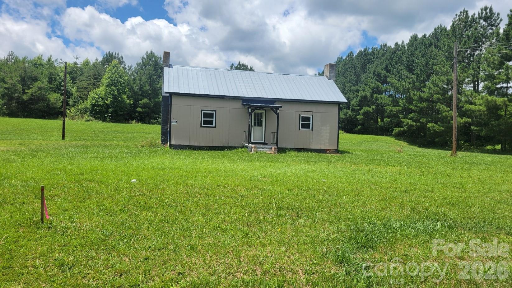 1672 Riverview Road Lincolnton, NC 28092 - Photo 8 of 16 a view of a house with a yard