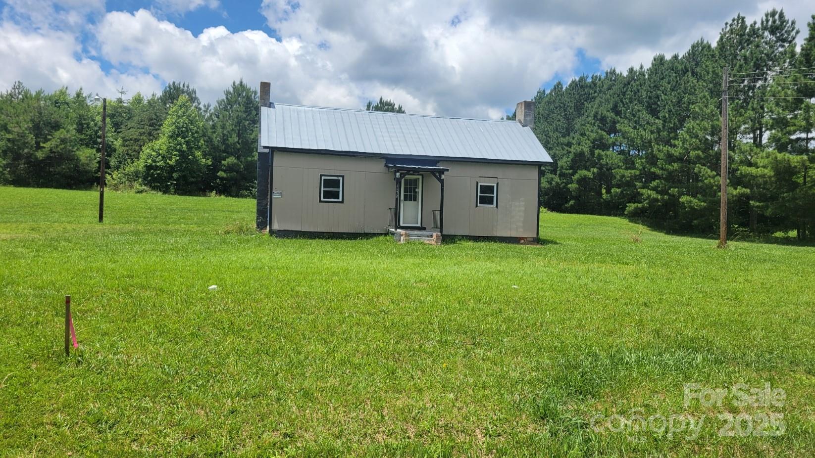 1672 Riverview Road Lincolnton, NC 28092 - Photo 8 of 15 a view of a house with a yard
