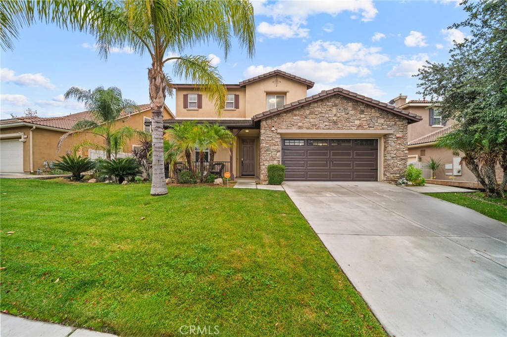 11345 Sanders Street Beaumont, CA 92223 - Photo 3 of 56 a front view of house with yard and green space