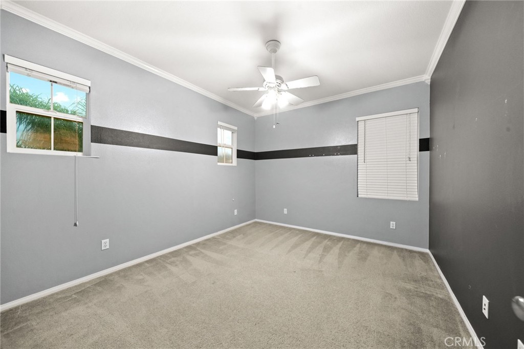 11345 Sanders Street Beaumont, CA 92223 - Photo 33 of 56 an empty room with a window