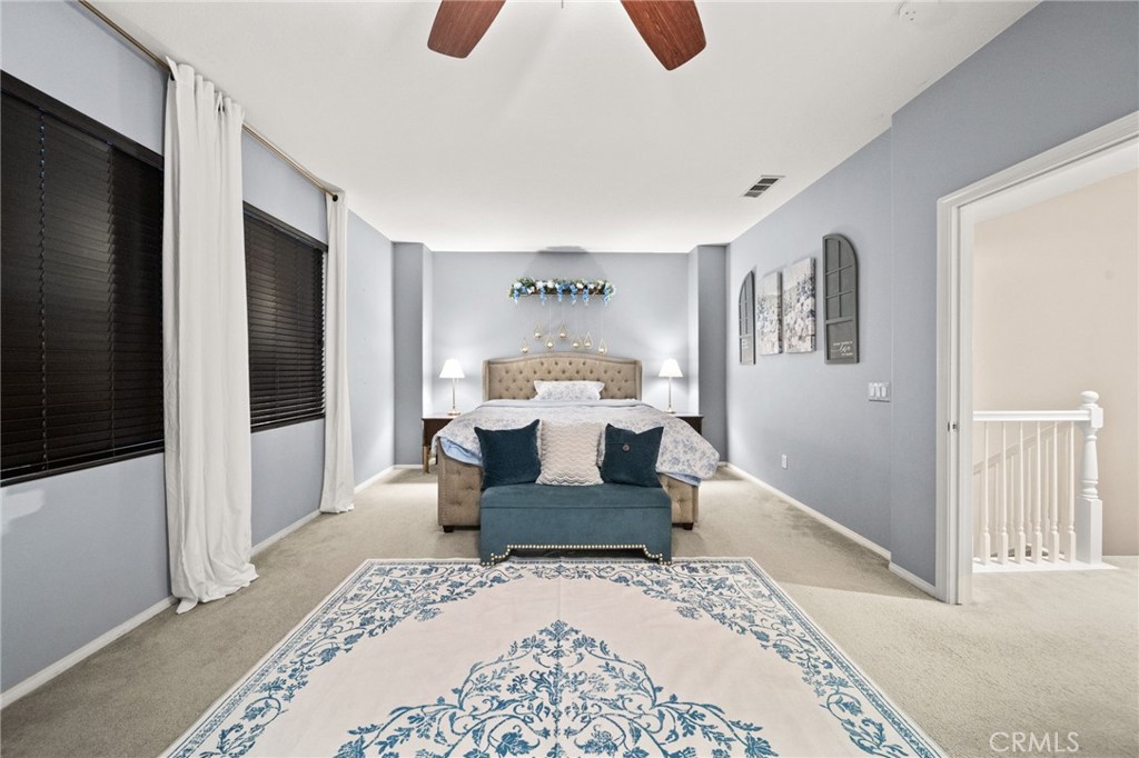 11345 Sanders Street Beaumont, CA 92223 - Photo 38 of 56 a living room with furniture and a rug