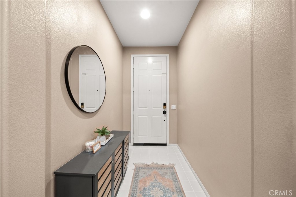 11345 Sanders Street Beaumont, CA 92223 - Photo 6 of 56 a bathroom with a sink and a mirror