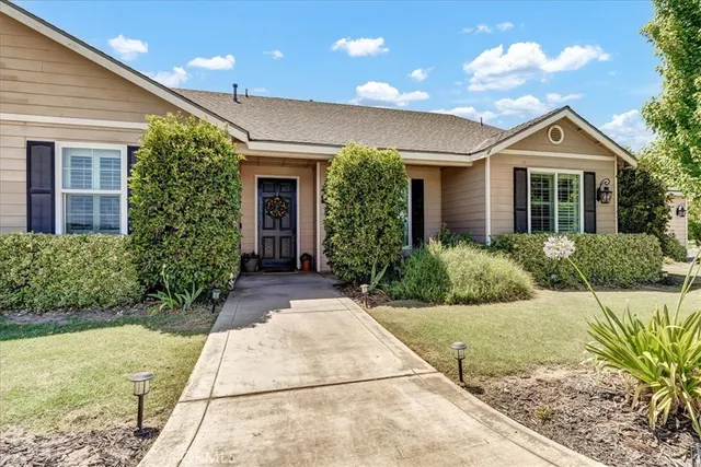 a view of kitchen and hall with wooden floor