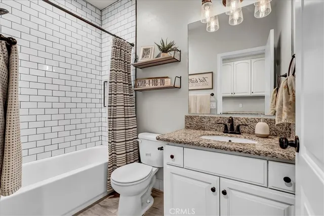 a bedroom with a bed and a book shelf