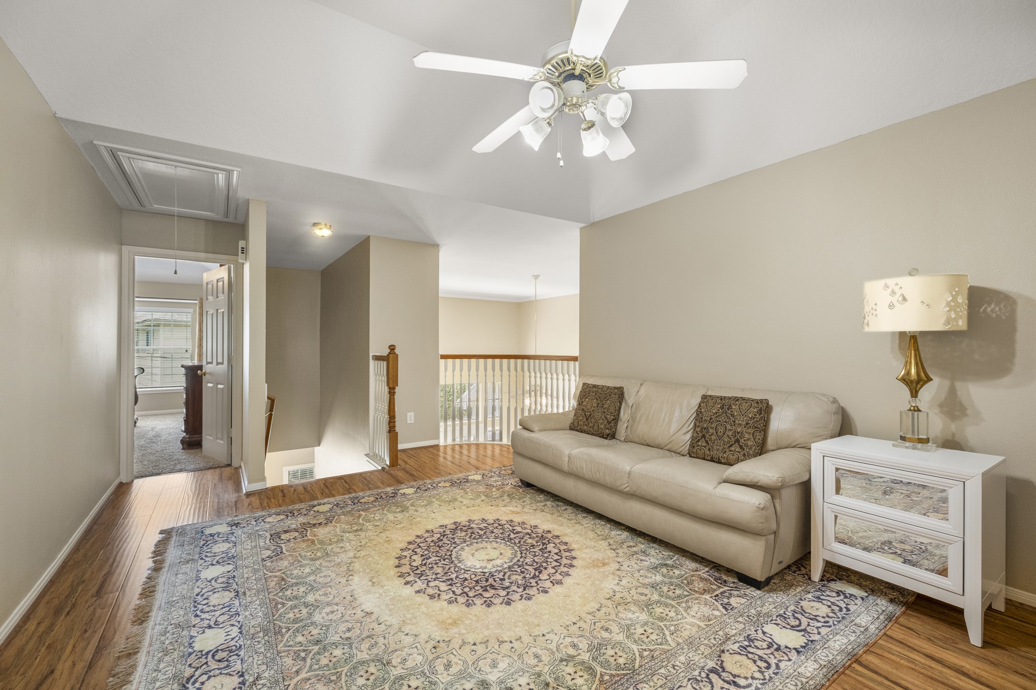 6830 Jasmine Place Spring, TX 77379 - Photo 21 of 38 a living room with furniture and a chandelier