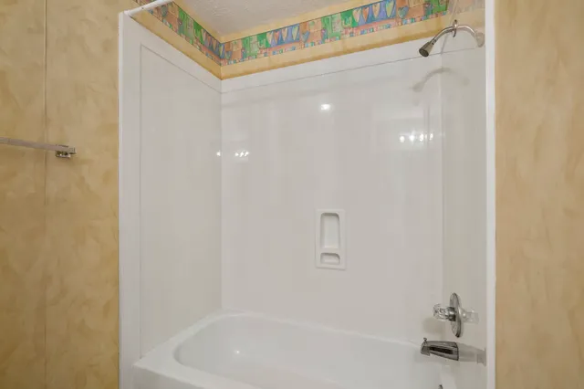 a bathroom with a bathtub