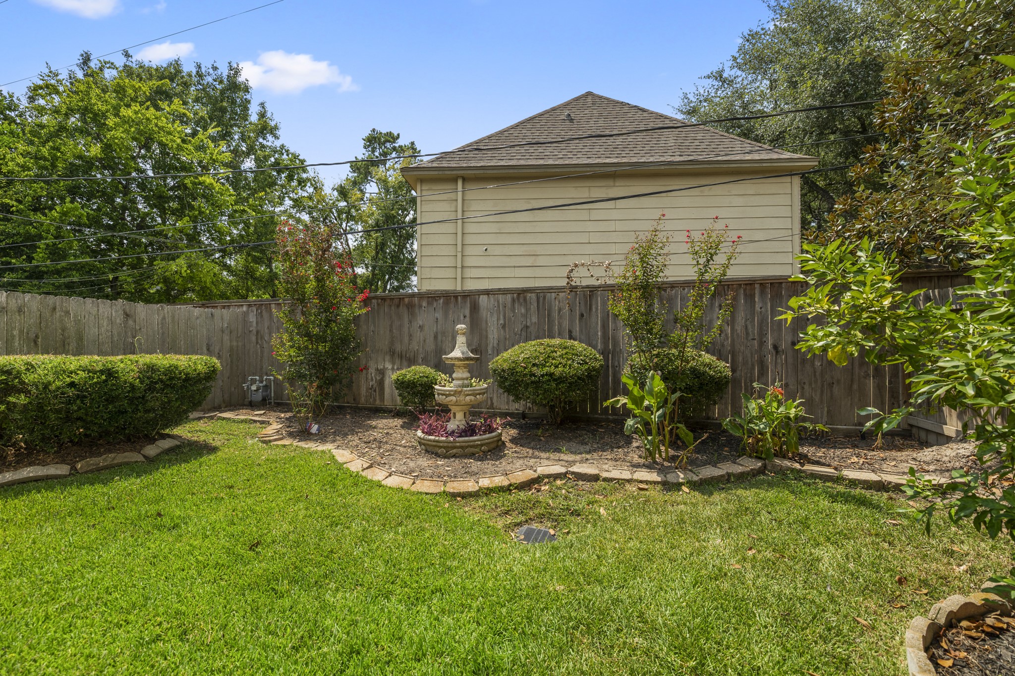 6830 Jasmine Place Spring, TX 77379 - Photo 34 of 38 a view of a backyard with a patio