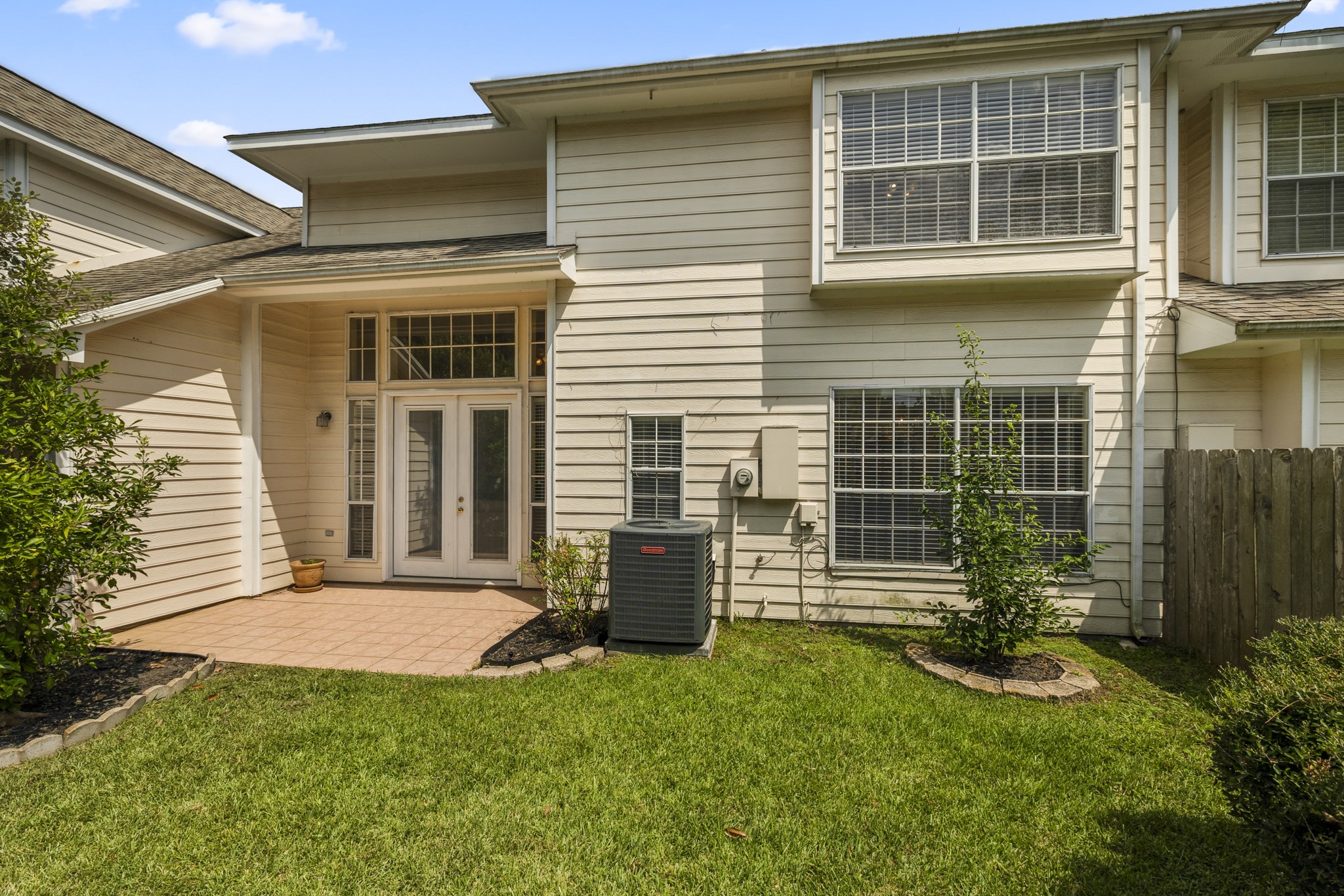 6830 Jasmine Place Spring, TX 77379 - Photo 35 of 38 a front view of a house with garden