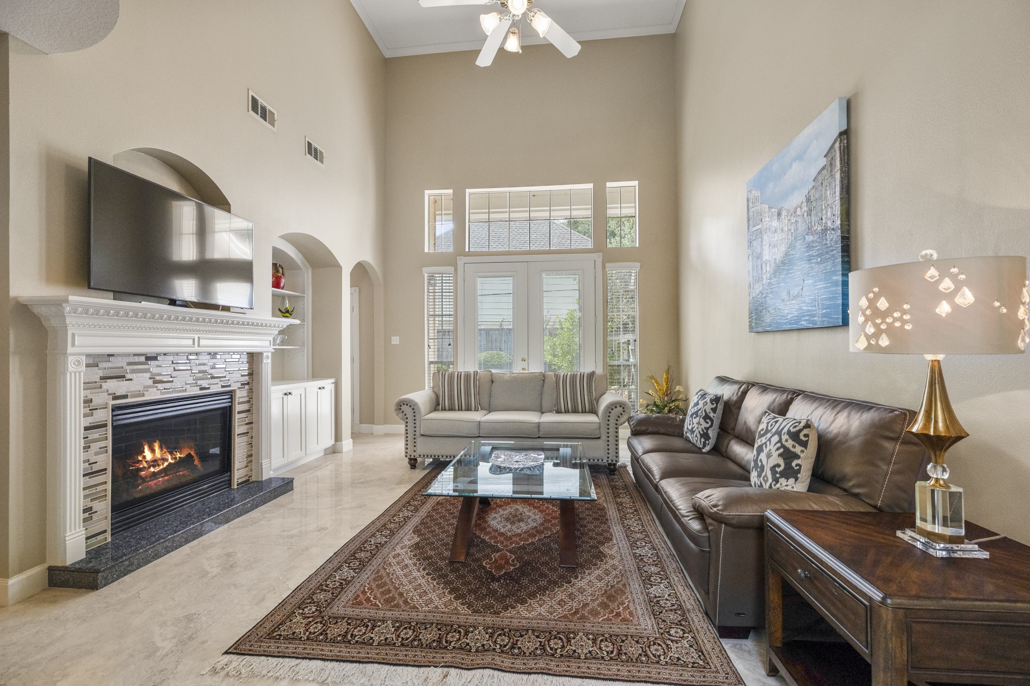 6830 Jasmine Place Spring, TX 77379 - Photo 5 of 38 a living room with furniture and a fireplace