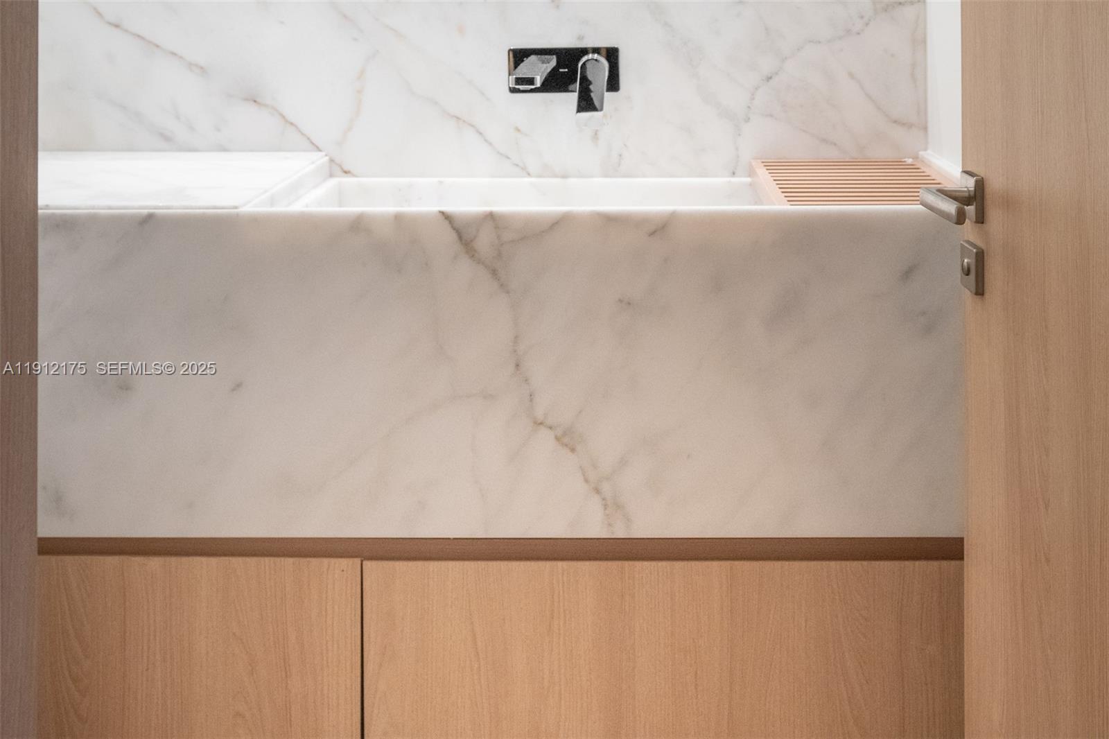 3 Grove Isle Drive, Unit C902 Miami, FL 33133 - Photo 7 of 7 a bathroom with a shower