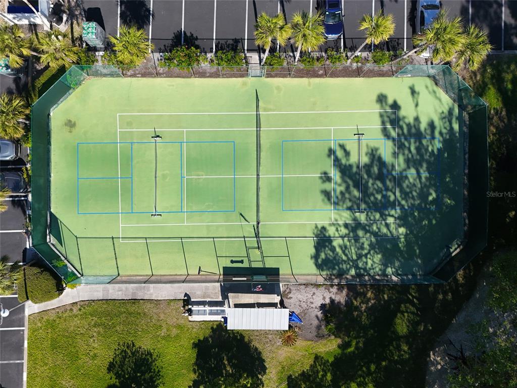 4420 Exeter Drive, Unit 303 Longboat Key, FL 34228 - Photo 35 of 42 a view of a garden