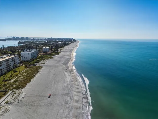 a view of ocean with beach