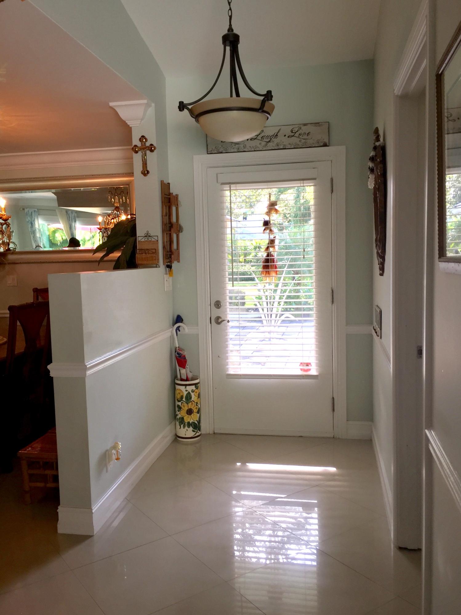 6887 Southwest Garnett Drive Stuart, FL 34997 - Photo 12 of 32 Front door interior