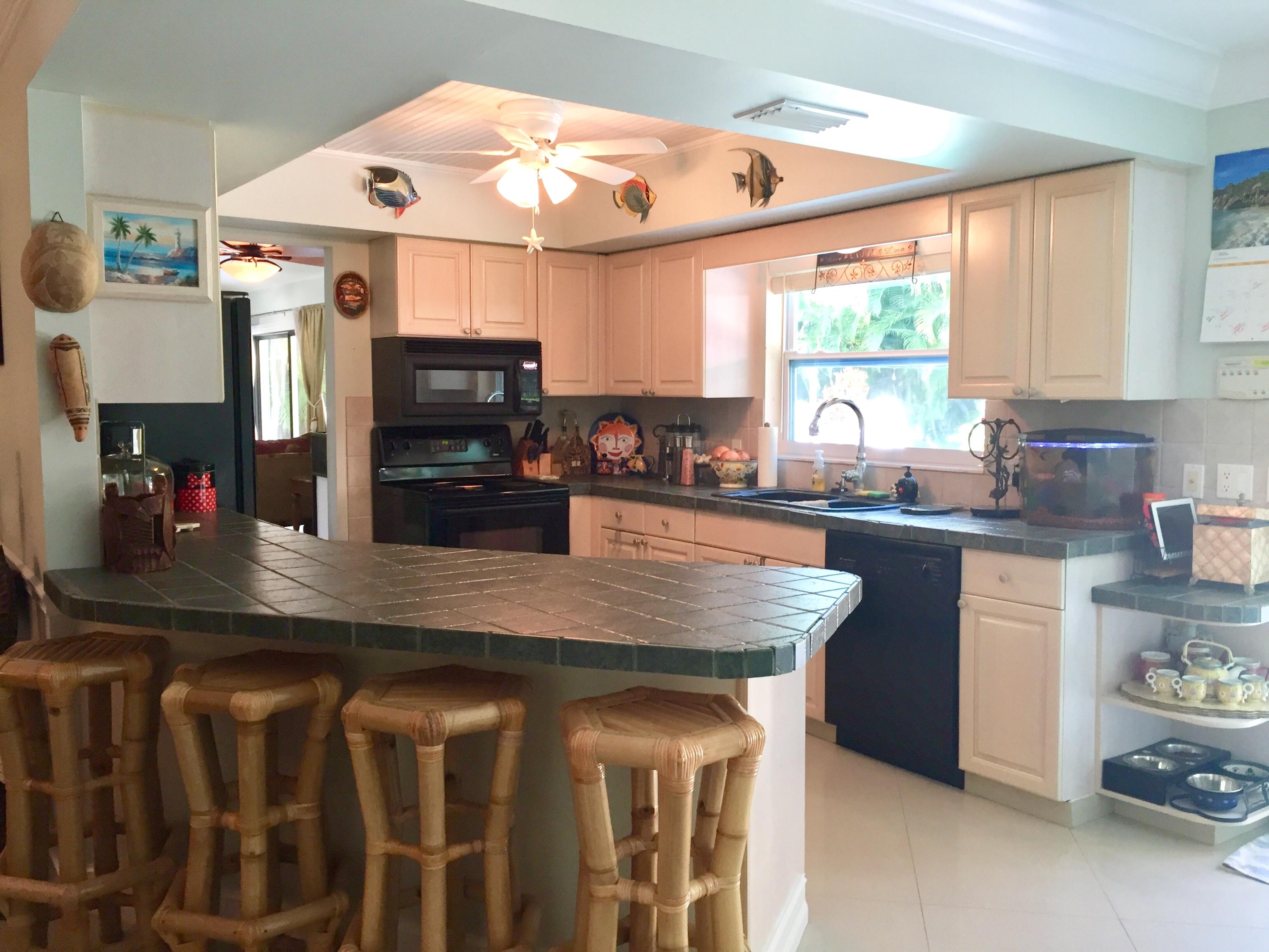 6887 Southwest Garnett Drive Stuart, FL 34997 - Photo 18 of 32 Open Kitchen