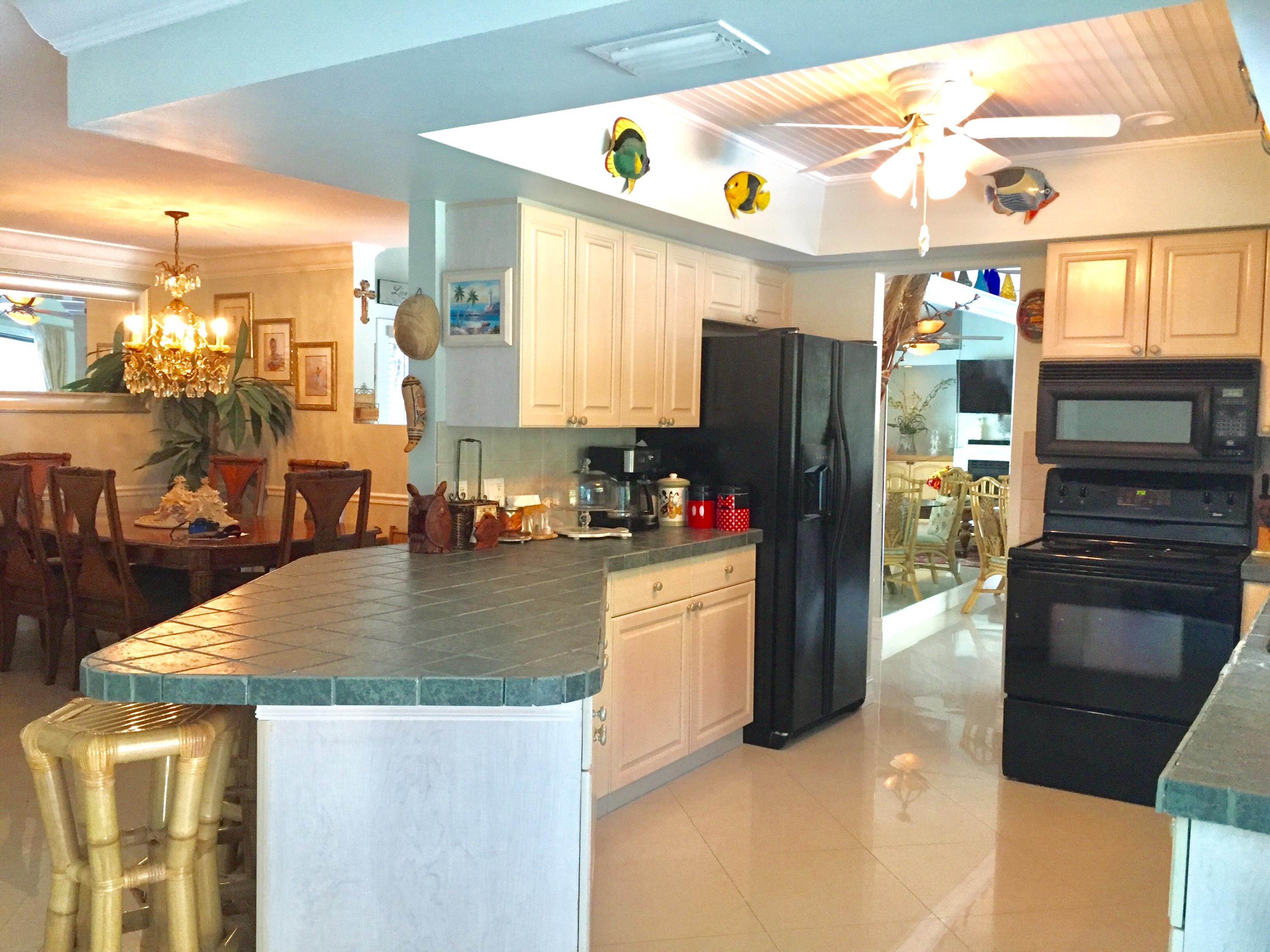 6887 Southwest Garnett Drive Stuart, FL 34997 - Photo 20 of 32 Open Kitchen