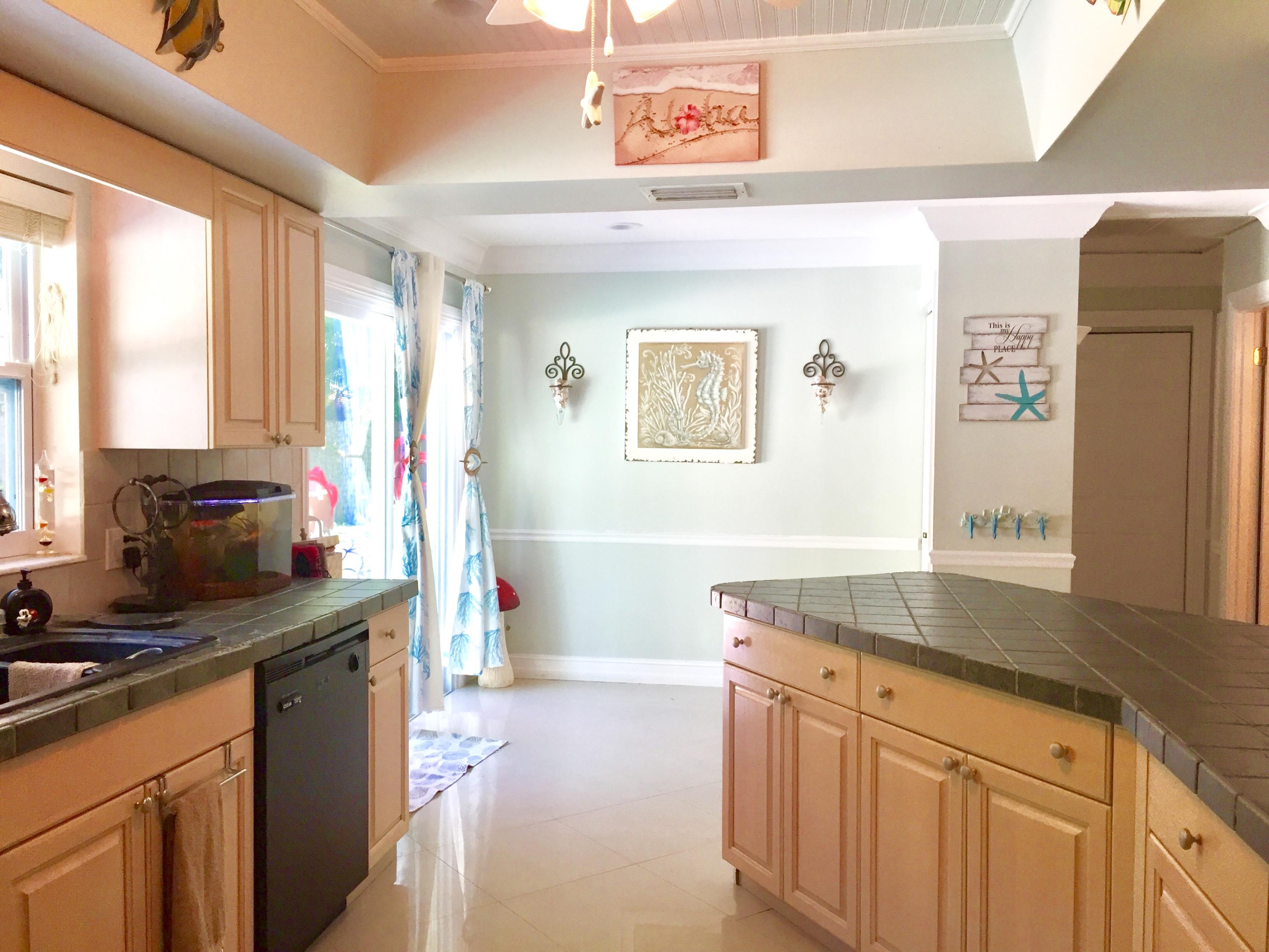 6887 Southwest Garnett Drive Stuart, FL 34997 - Photo 21 of 32 Open Kitchen