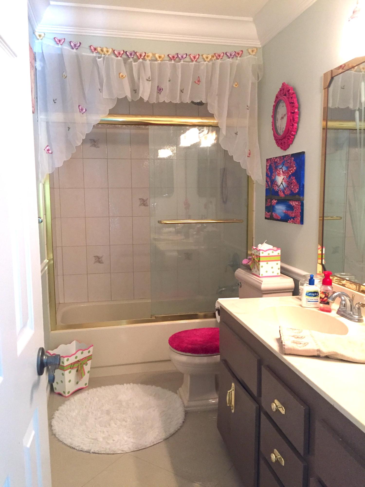 6887 Southwest Garnett Drive Stuart, FL 34997 - Photo 26 of 32 Guest Bath