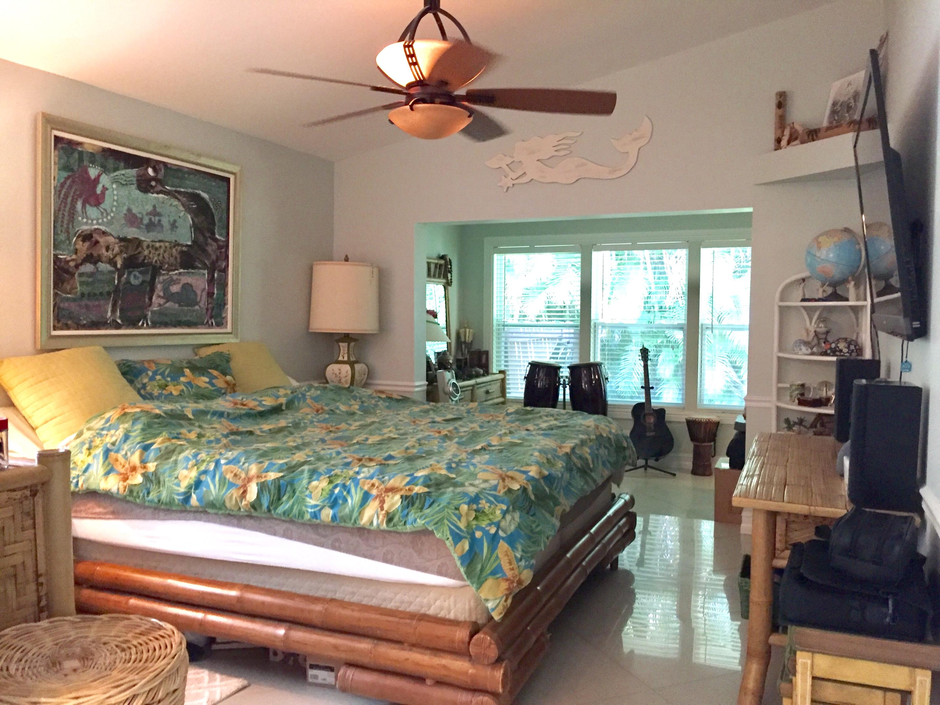 6887 Southwest Garnett Drive Stuart, FL 34997 - Photo 27 of 32 Master Bedroom