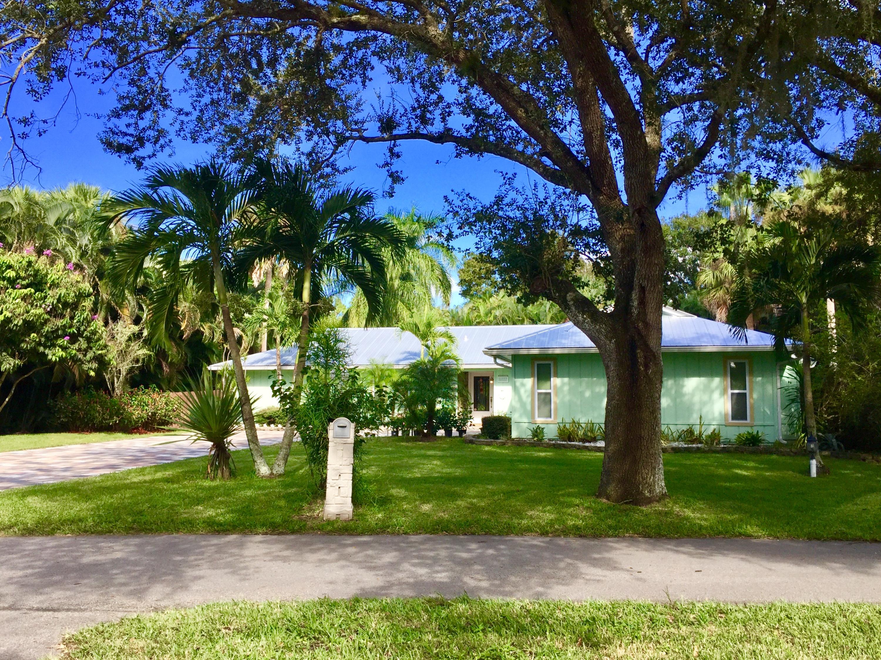 6887 Southwest Garnett Drive Stuart, FL 34997 - Photo 3 of 32 Front