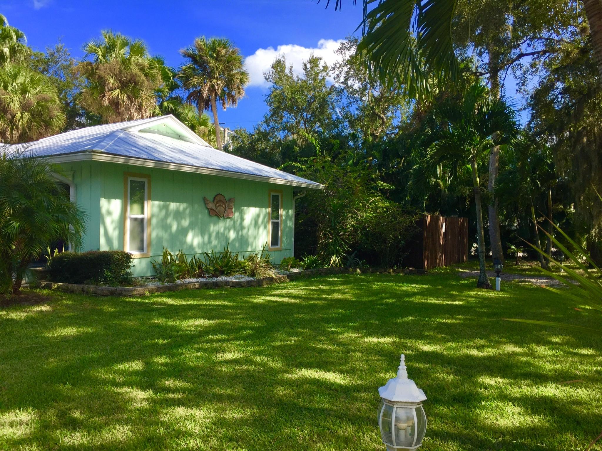 6887 Southwest Garnett Drive Stuart, FL 34997 - Photo 4 of 32 Front