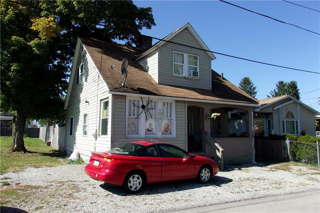 15 Murphy Street Uniontown, PA 15401 - Photo 1 of 7 a front view of a house with cars parked
