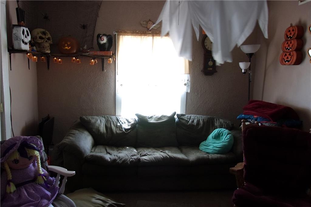 15 Murphy Street Uniontown, PA 15401 - Photo 5 of 7 a living room with furniture and a window