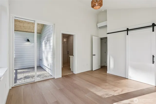a view of entryway with wooden floor