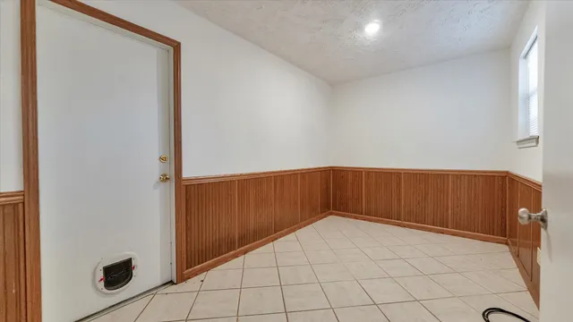 a view of a livingroom with furniture and window
