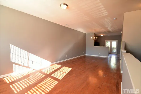 a view of hallway with a window