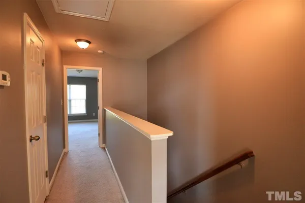 a view of hallway with stairs