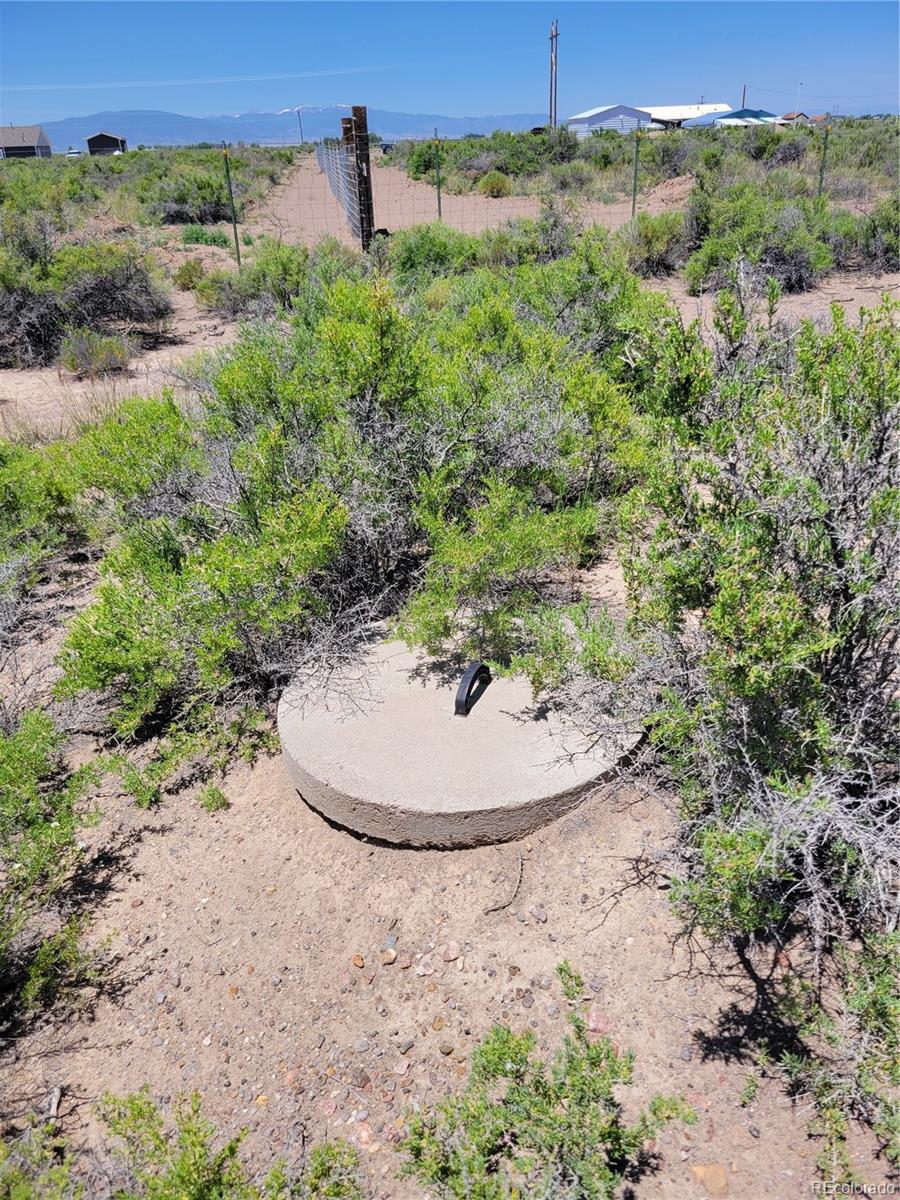 6185 Hart Road Alamosa, CO 81101 - Photo 13 of 19 a view of a backyard