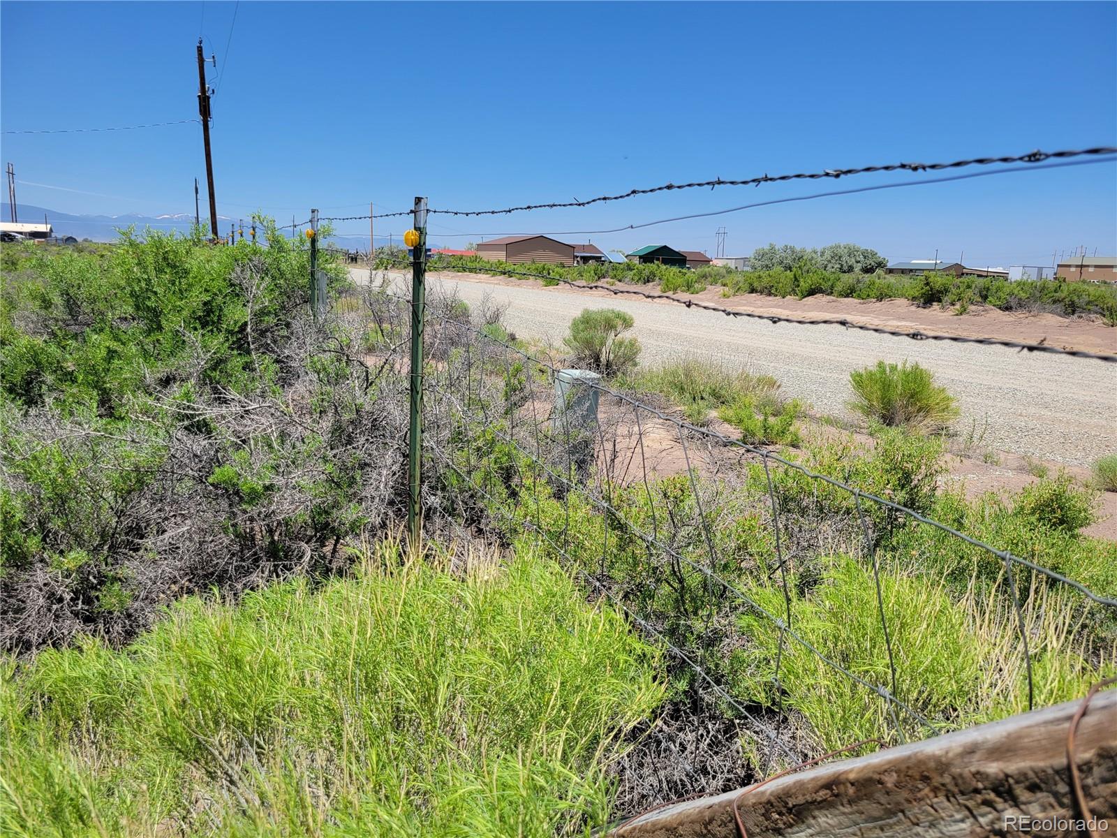 6185 Hart Road Alamosa, CO 81101 - Photo 18 of 19 a view of a lake