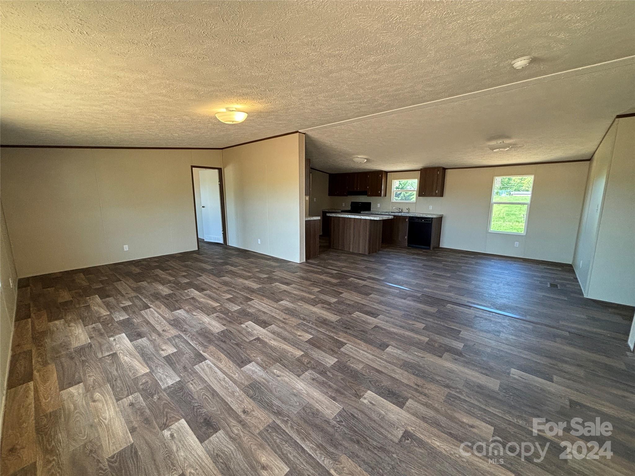 4805 Troy Road Hudson, NC 28638 - Photo 16 of 36 a view of a room with window and wooden floor