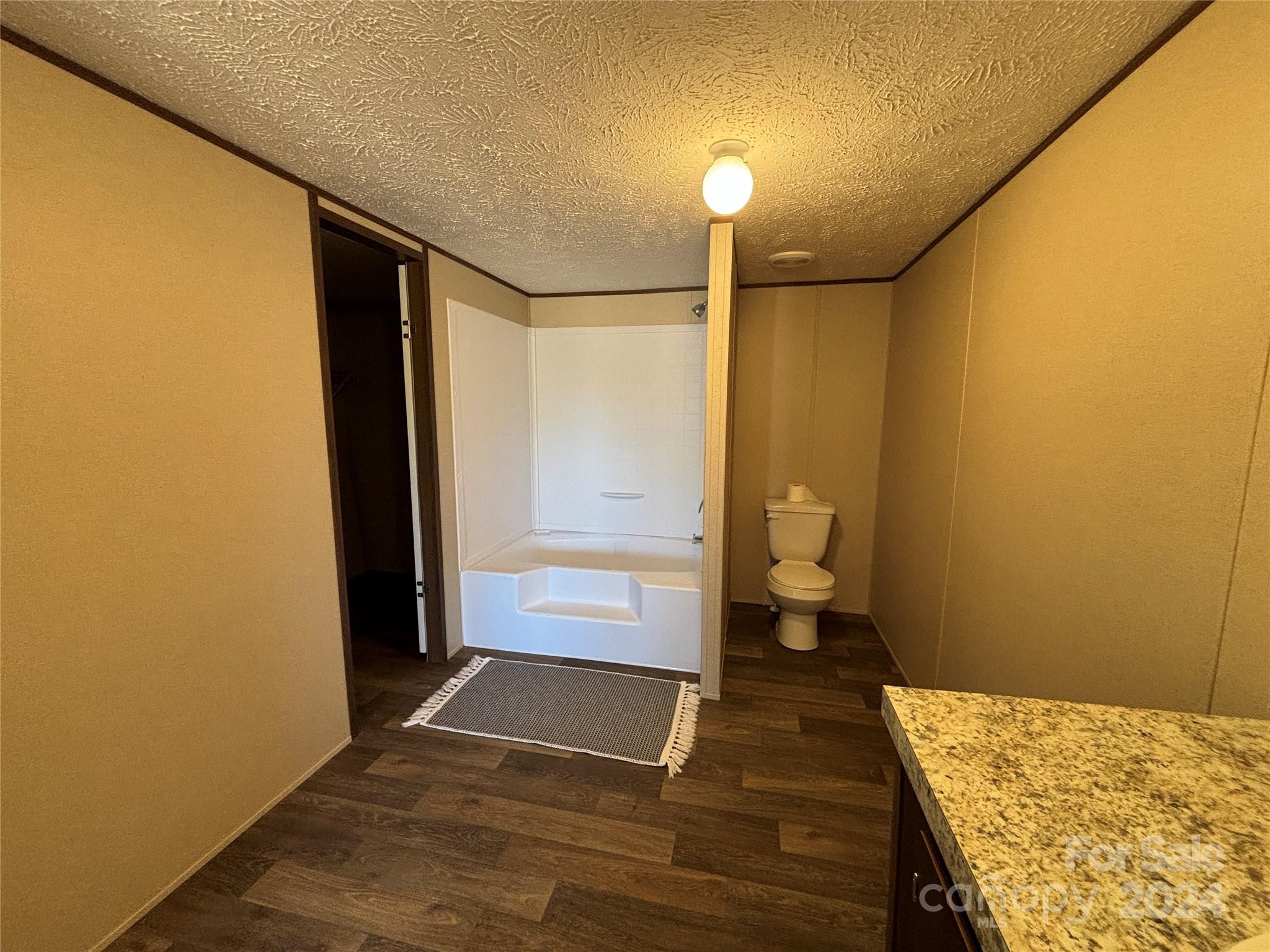 4805 Troy Road Hudson, NC 28638 - Photo 36 of 36 a bathroom with a sink and toilet