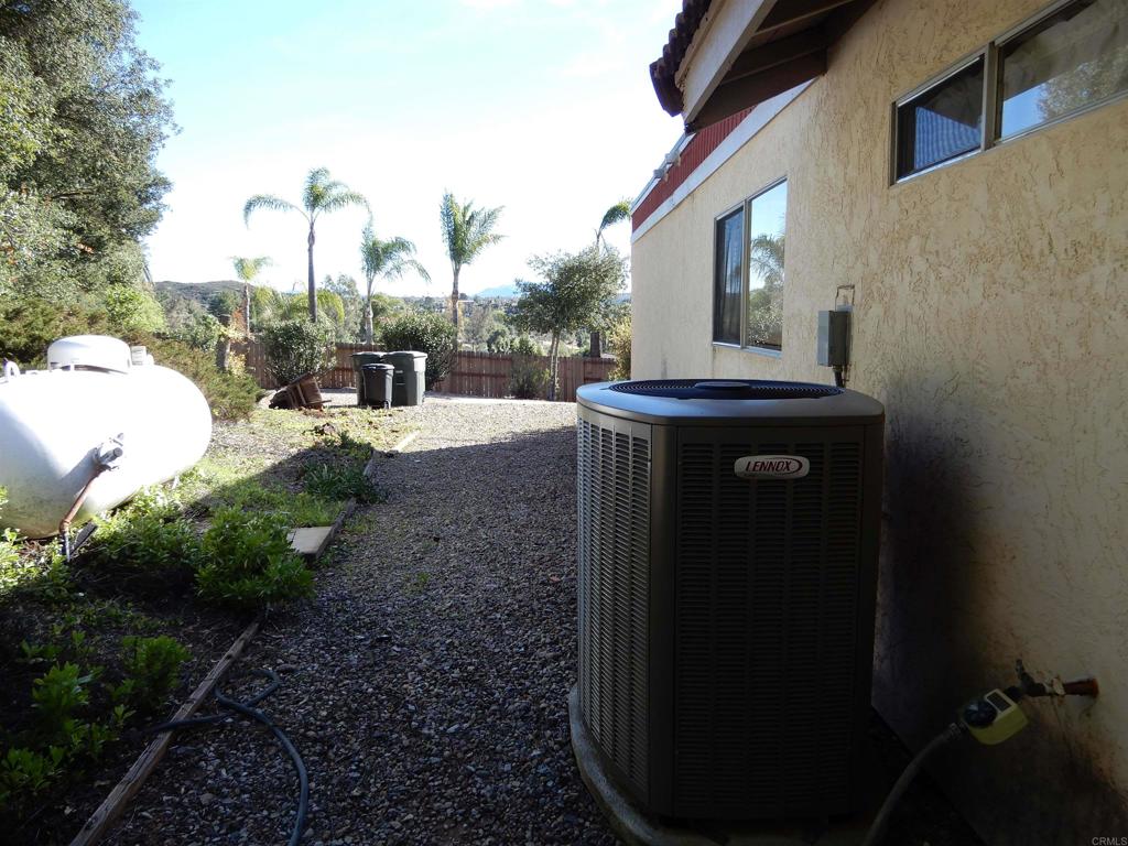 24368 Del Amo Road Ramona, CA 92065 - Photo 29 of 30 AC & propane tank