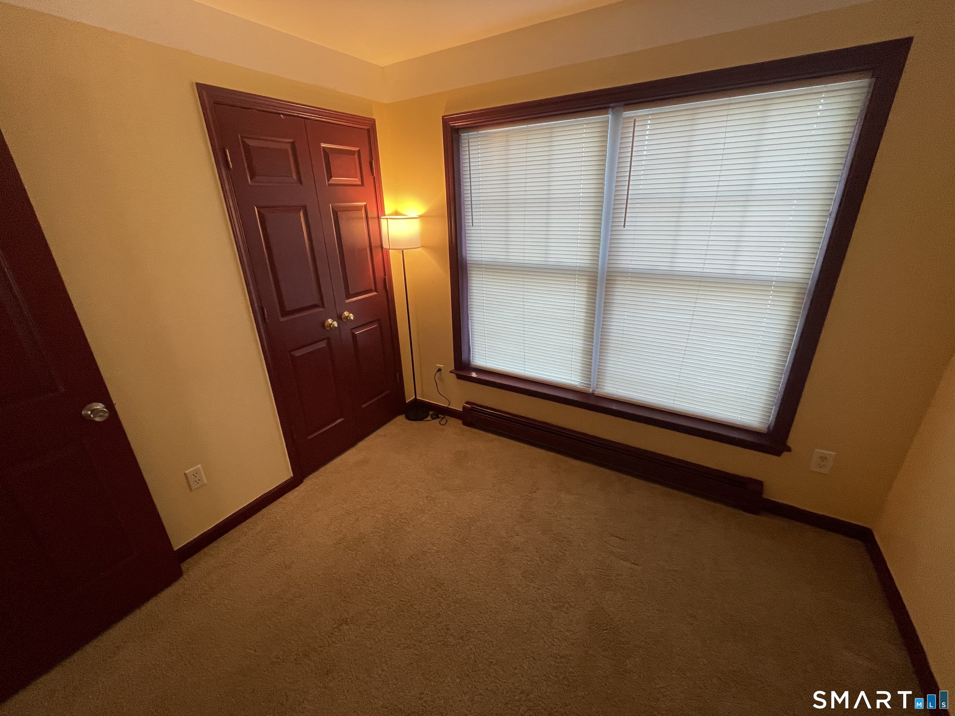 11 Button Street New Haven, CT 06519 - Photo 10 of 18 an empty room with windows