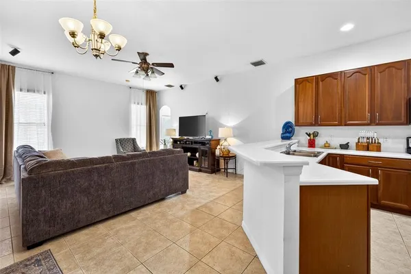 a kitchen with a sink and a window