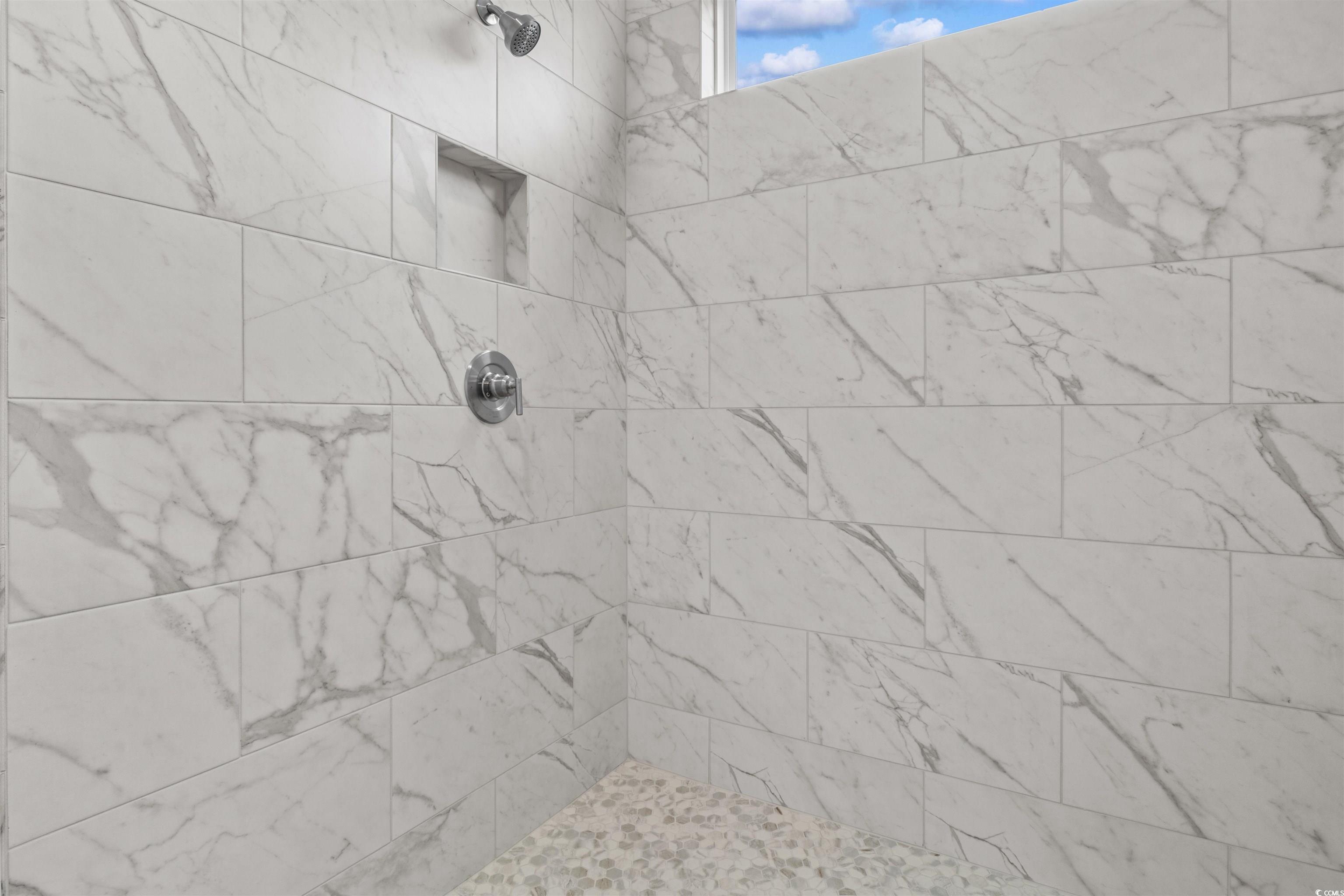 1906 Woodrush Loop Little River, SC 29566 - Photo 22 of 40 Bathroom with tiled shower