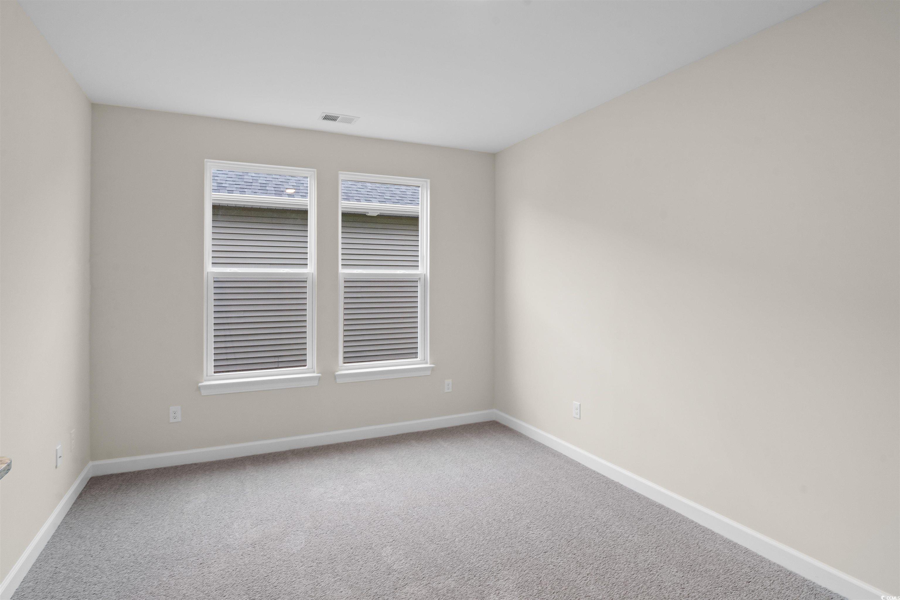 1906 Woodrush Loop Little River, SC 29566 - Photo 6 of 40 View of carpeted spare room