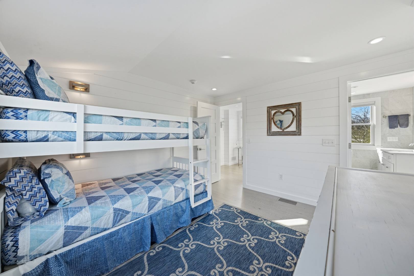 10 Pilgrim Road Nantucket, MA 02554 - Photo 41 of 65 a bedroom with a bed and a window