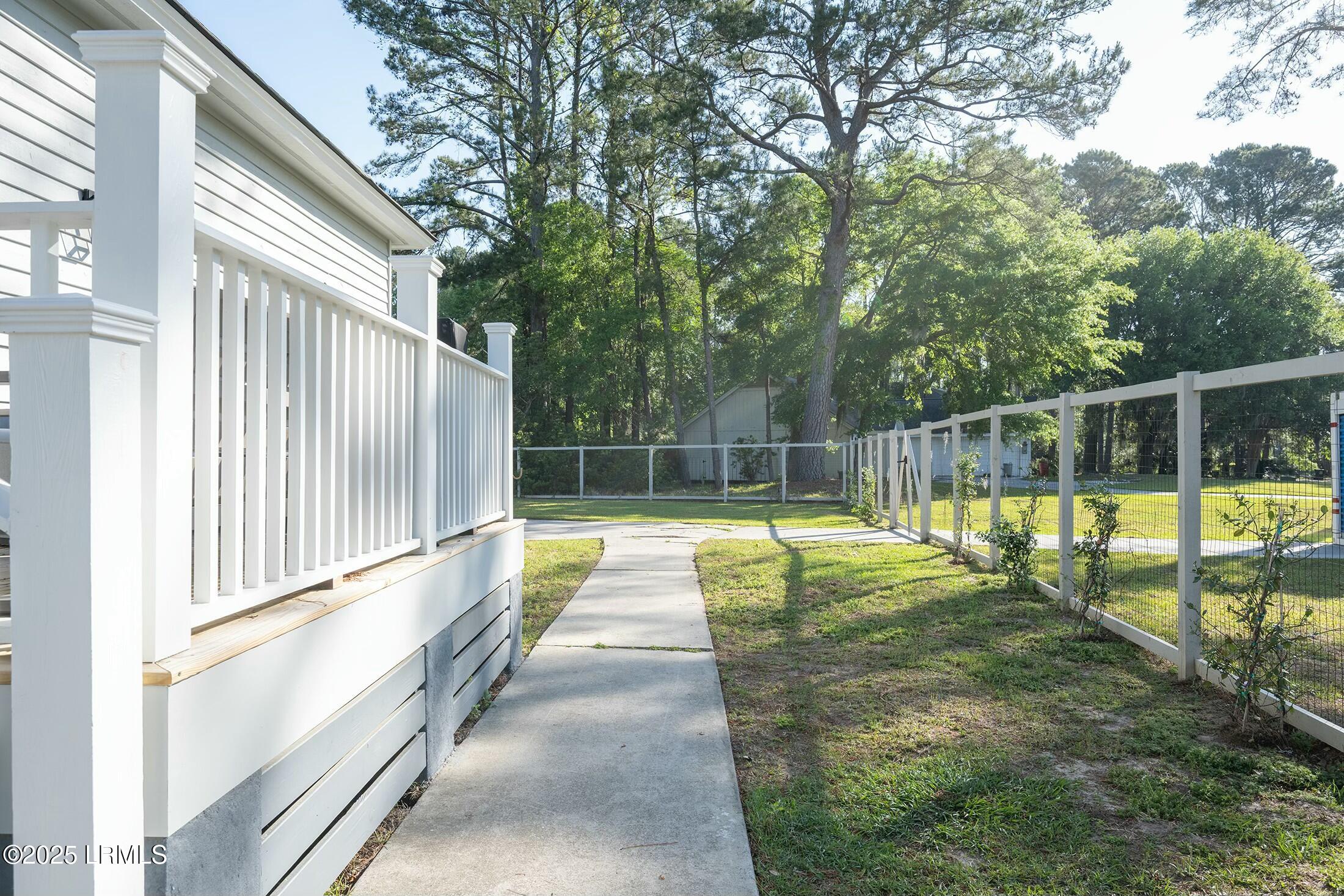 277 Pleasant Point Drive Beaufort, SC 29907 - Photo 33 of 46 Sidewalk to Rear of Home