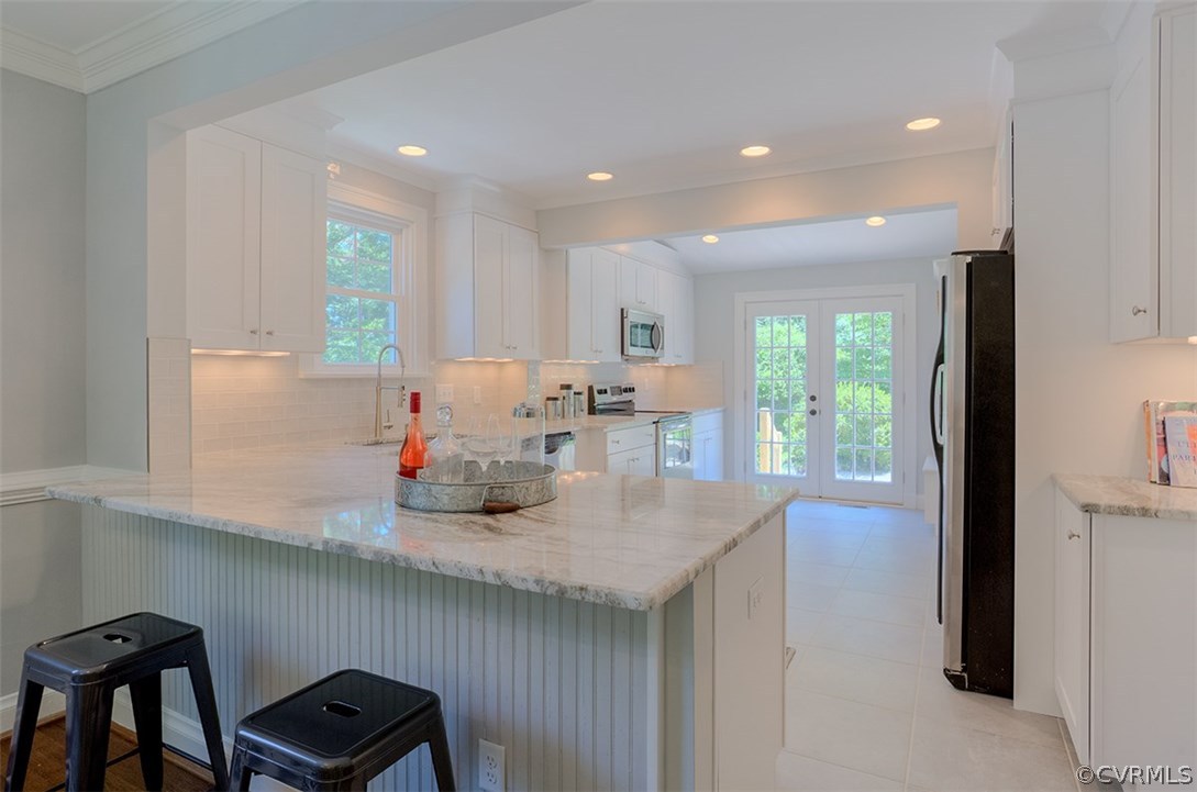 7110 Cherokee Road Richmond, VA 23225 - Photo 12 of 47 Top of the line granite counter tops, tile floor,